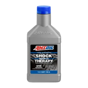 Botella original de Amsoil Shock Therapy 10 Medium. Fluido 100% sintético para horquillas y amortiguadores de motocicletas y off-road disponible en Lima, Perú.